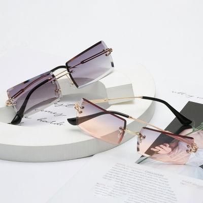 2022 New Fashion Trend Simple Design Punk Style Frameless Metal Sun Glasses Small Square UV400 Sunglasses