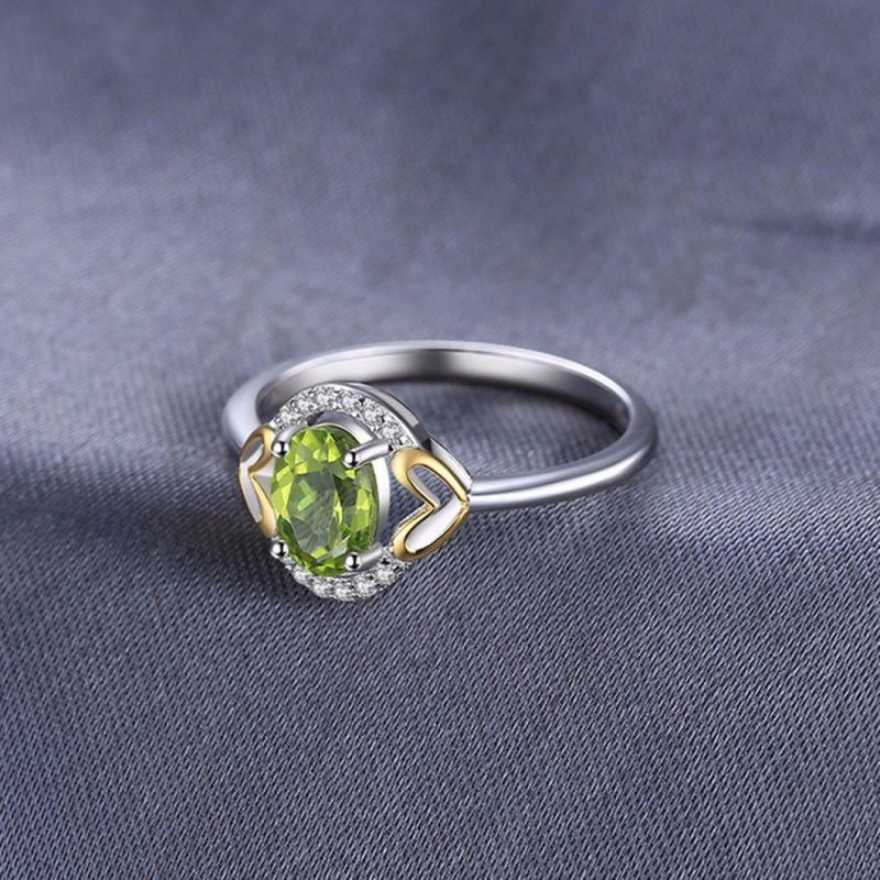 Gold Plated Imitation Jewelry Fashion Ring in Peridot Color with Cubic Zirconia