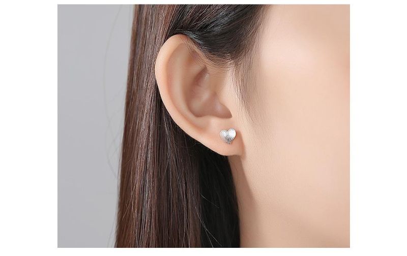 Silver Earrings Stud in Pressed Sand Shiny Surface