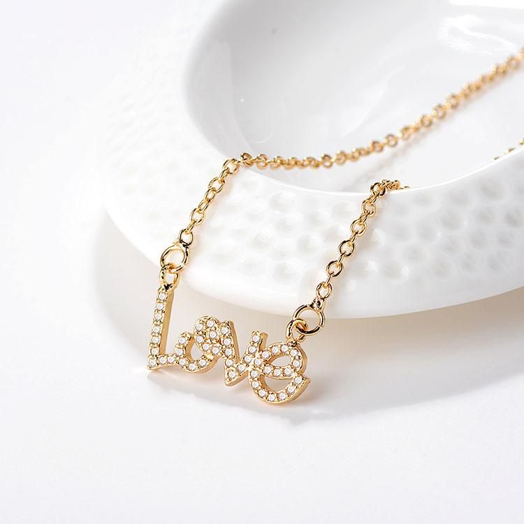 Wholesale Women′s Accessories The Latest New Models of Gold Long Chains Necklace with Bowknot Pendant