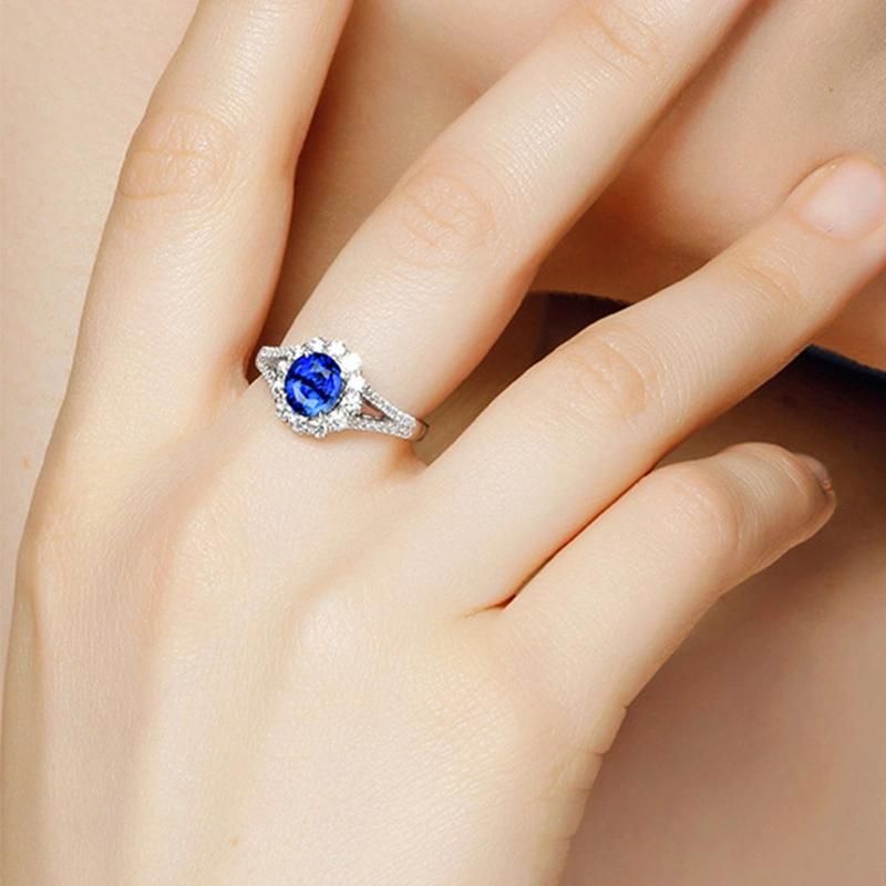 Four Claw Sapphire Blue Crystal with Diamond Ring