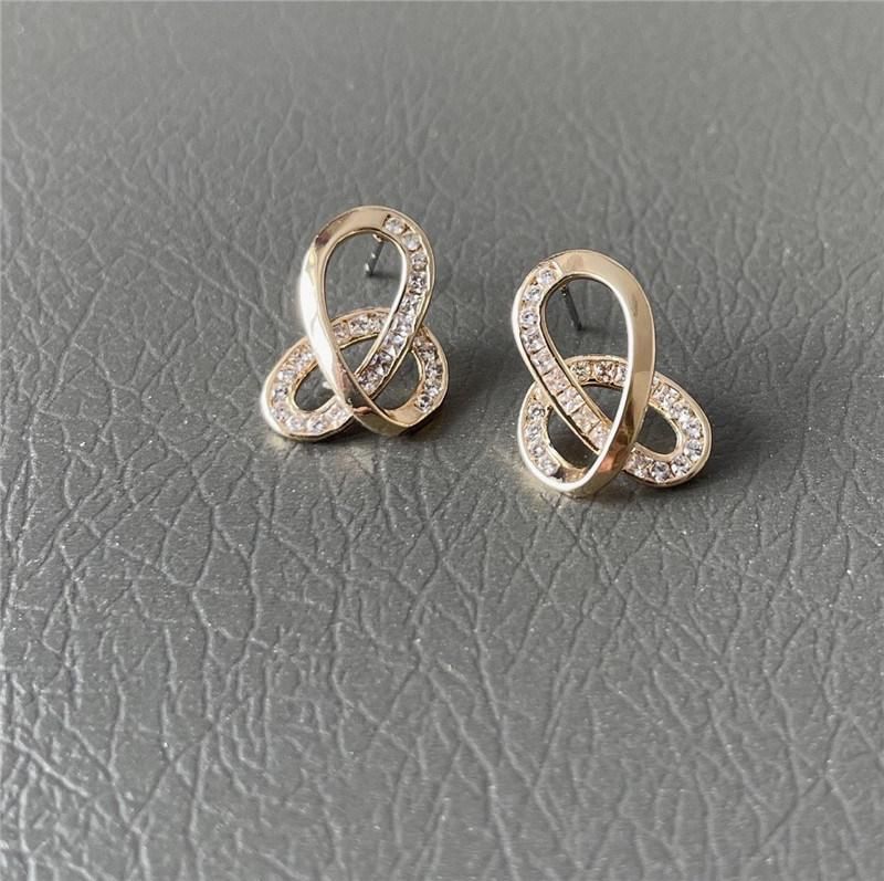 18K Gold Plated Brass Alloy Crystal Cubic Zircon Interlocking Stud Earrings for Fashion Accessories