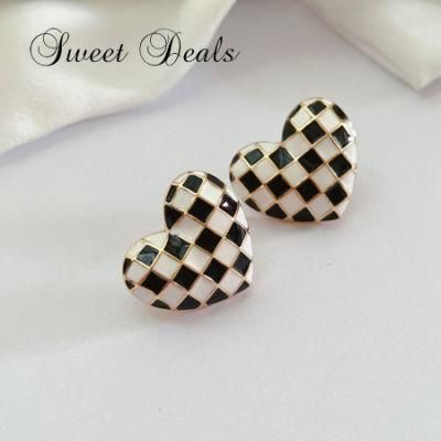 Fashion Black and White Plaid Peach Heart Drip Oil Silver Stud Earrings