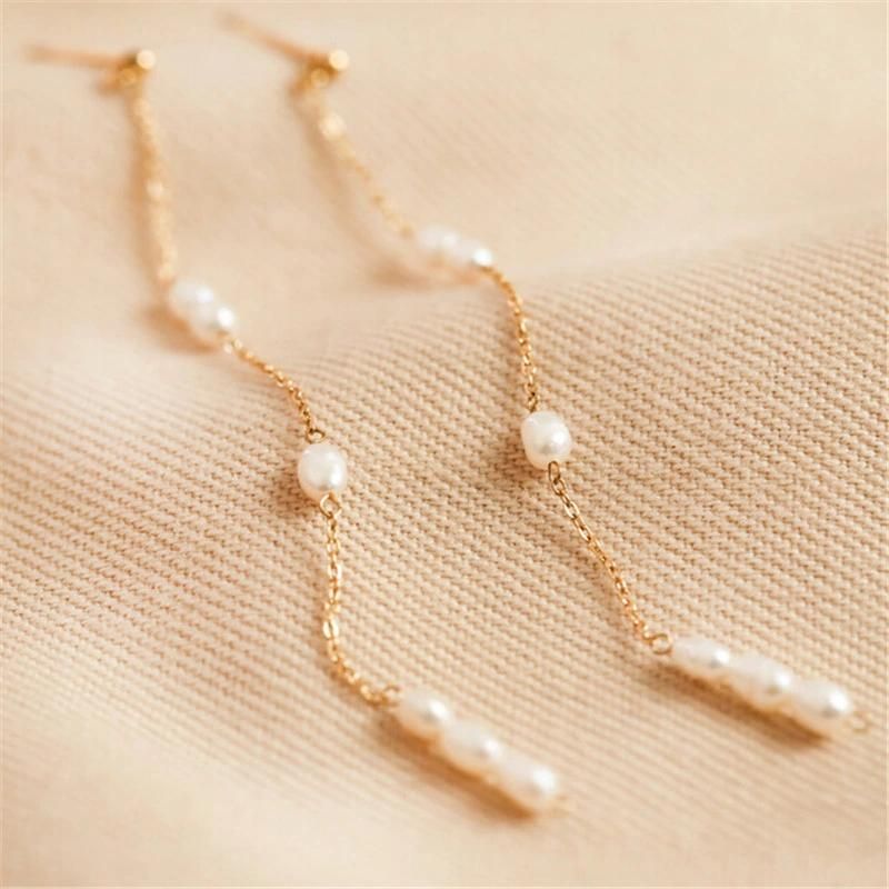 Fashion Accessories Gold Stainless Steel and Long Drop Pearl Earrings