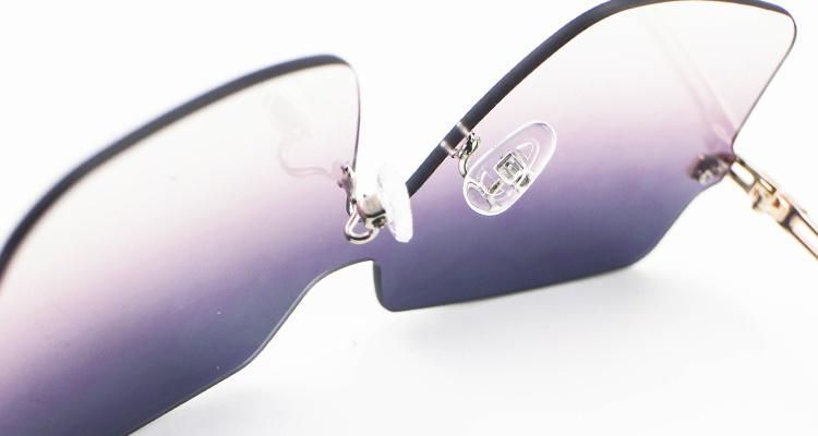 Gradual Individuality Metal Rimless Frame Women Stock Sunglasses