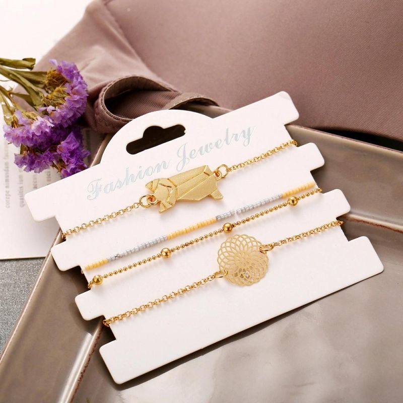 Fashion Jewelry Gold Multi-Layer Alloy Bracelet with Hollowed-out Pattern and Cat Charm
