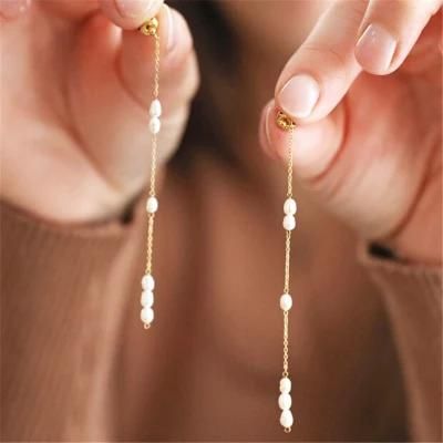 Fashion Accessories Gold Stainless Steel and Long Drop Pearl Earrings