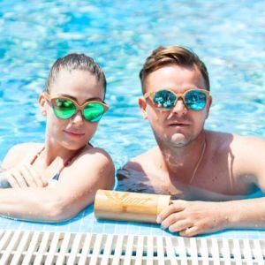 Unisex Kat-Eye Bamboo Wooden Sunglasses Floating in Water