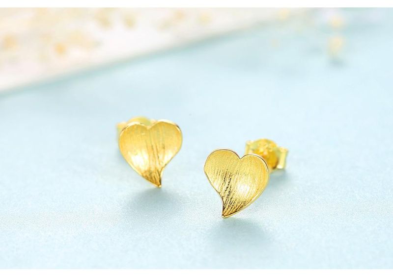 Silver Earrings Stud in Pressed Sand Shiny Surface