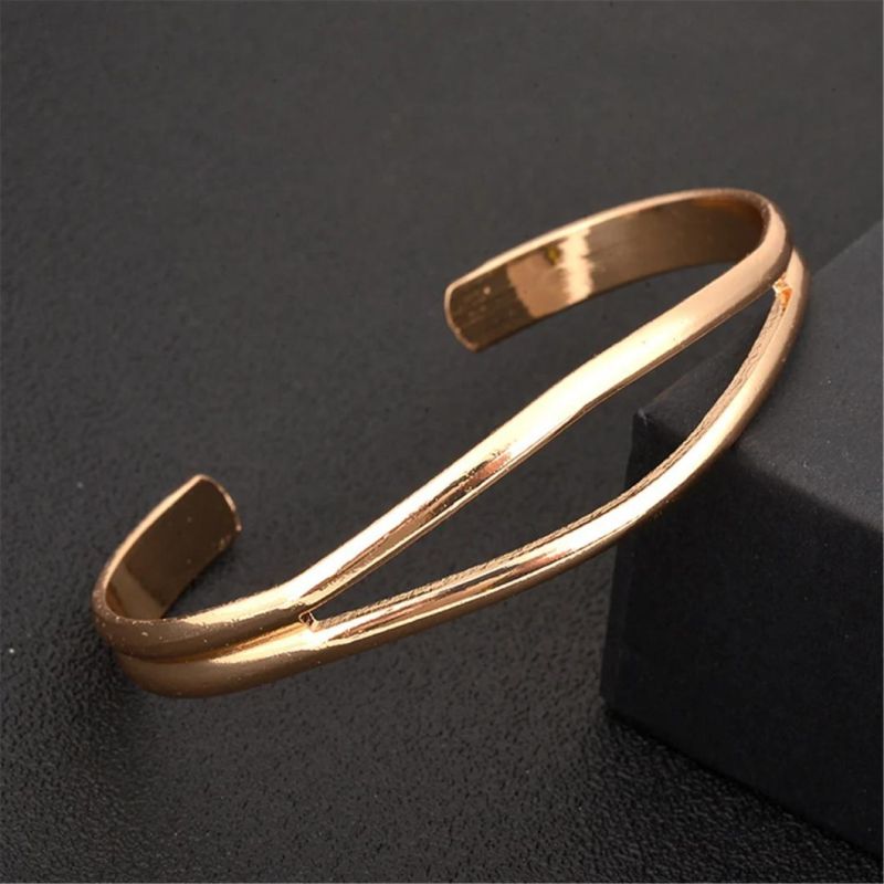 Fashion Personality Simple Generous Alloy Hollow Bracelet Gold Couple Bangles for Men Women Designs