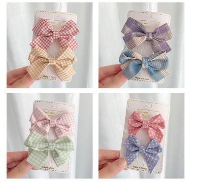 The Bowknot Is a Korean Style Child Pattern Color Minimalist Hairpin